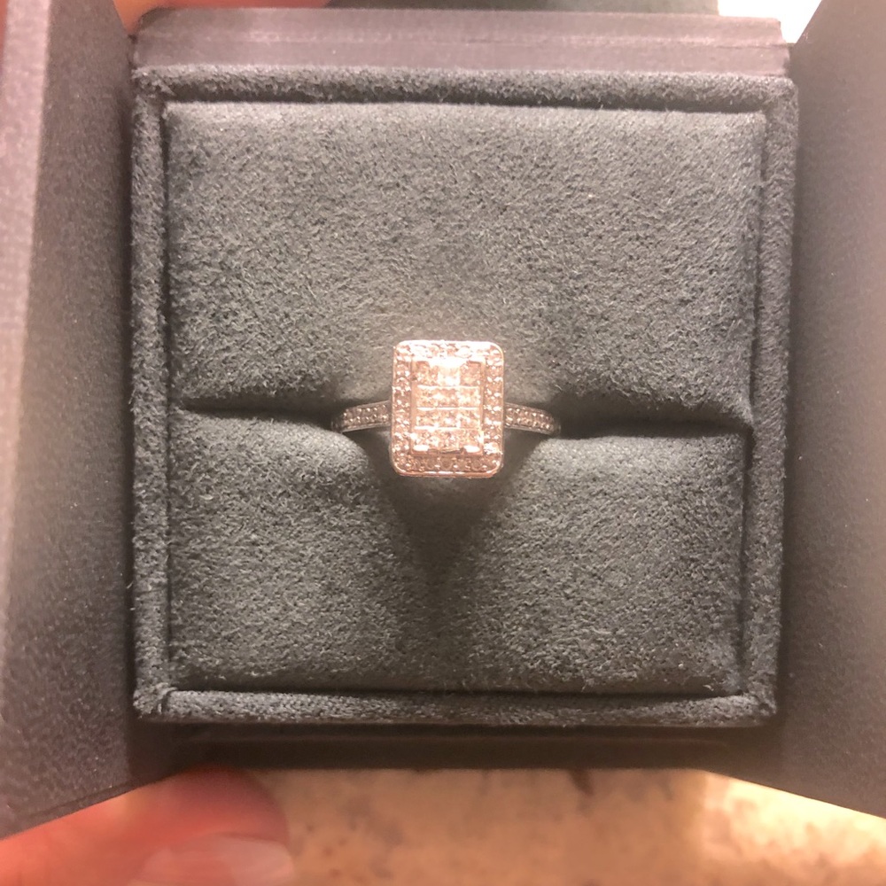 Woman’s diamond ring.
